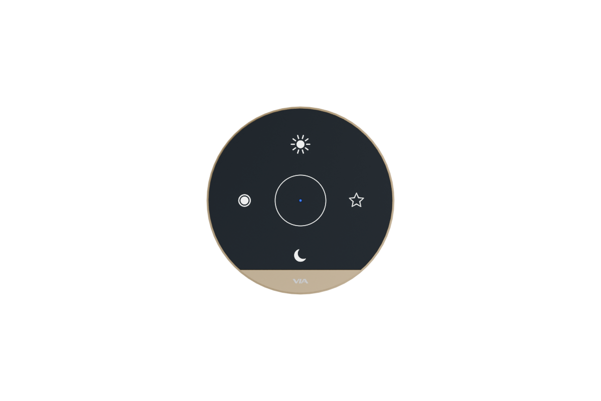 VIA NEXUS SE studio render — Circular remote with sun, ring, star and moon